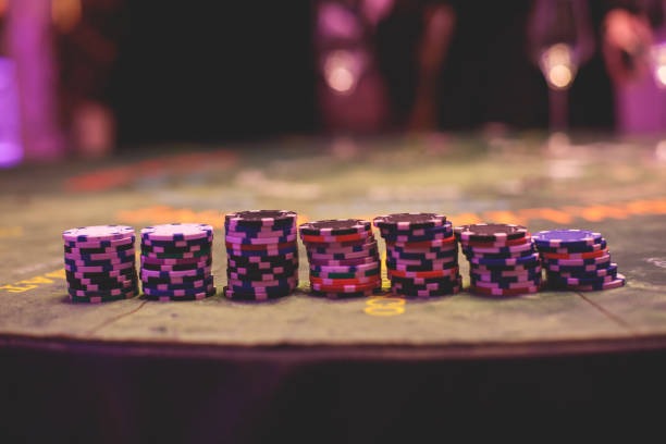moze live-dealer studio with blackjack table and professional croupier managing the game